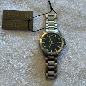 Bulova Stainless Steel Water Resistant Black Face Watch. Brand New with tags.